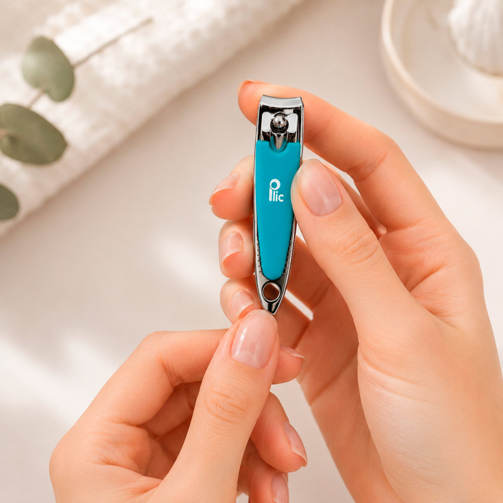 Blue manicure nail clipper in stainless steel